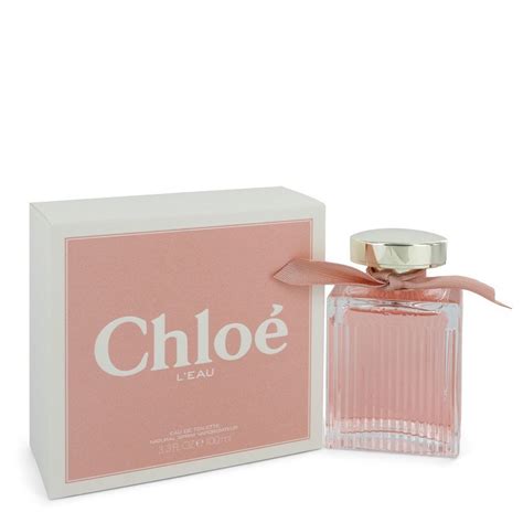 chloe perfume with pink ribbon.